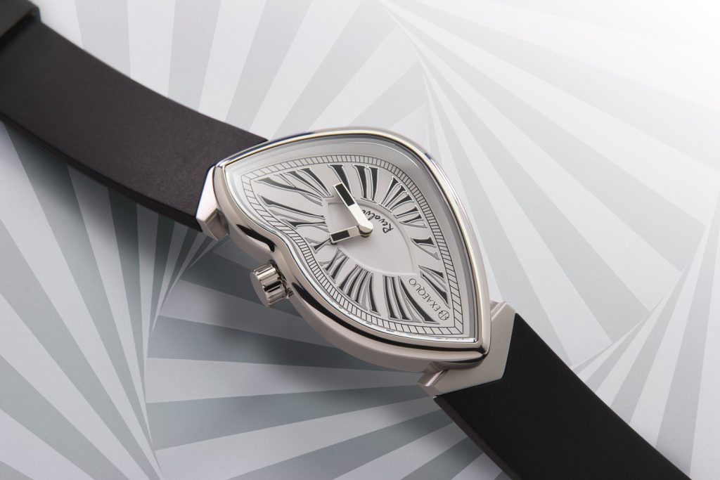 Surreal Reflections: Revolve Debuts in Silver Shine